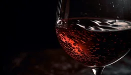 vecteezy_luxury-wineglass-pouring-dark-liquid-reflecting-elegance_27902180.webp